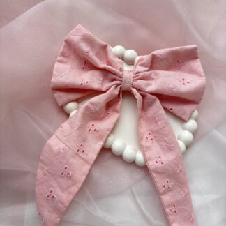New Arrivals pink bow