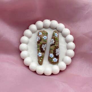 New Arrivals floral grace clip