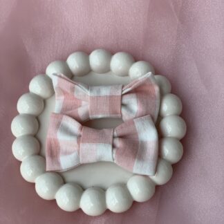 New Arrivals pink checks bow