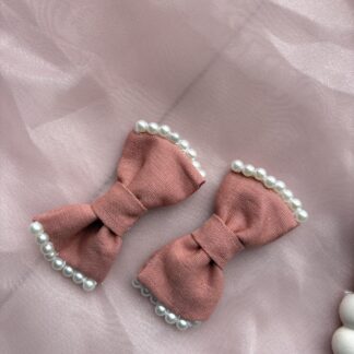 New Arrivals blush pearl bow pin