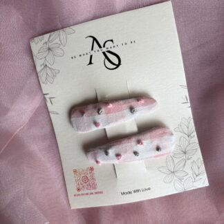 New Arrivals pink checks clips